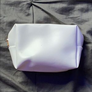 White and gold makeup bag